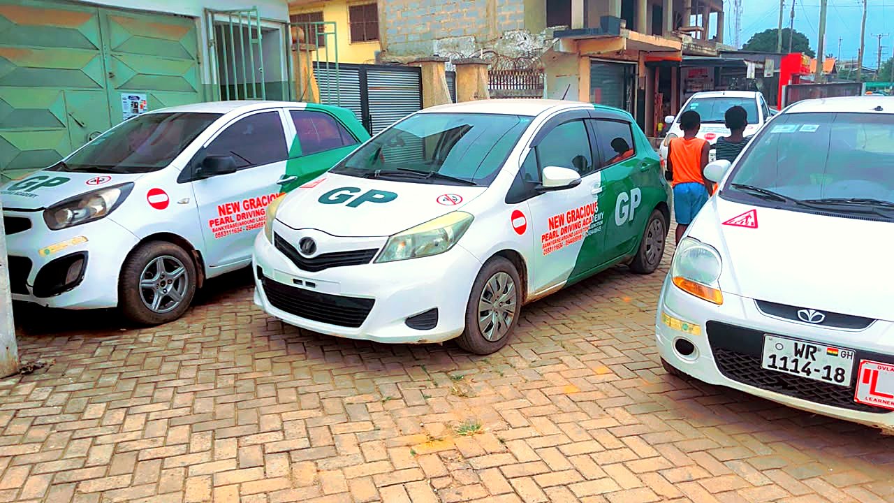 Gracious Pearl training cars parked outside the academy