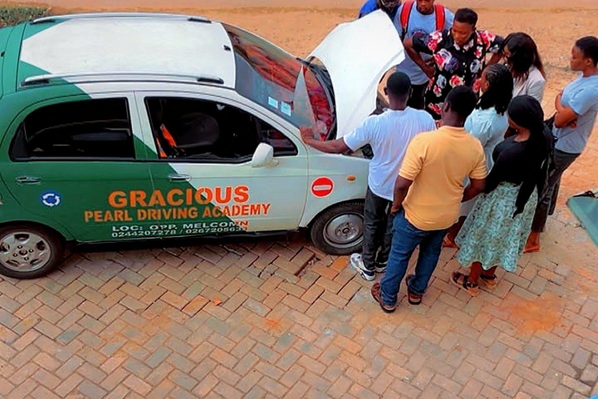 Students learning under the bonnet
