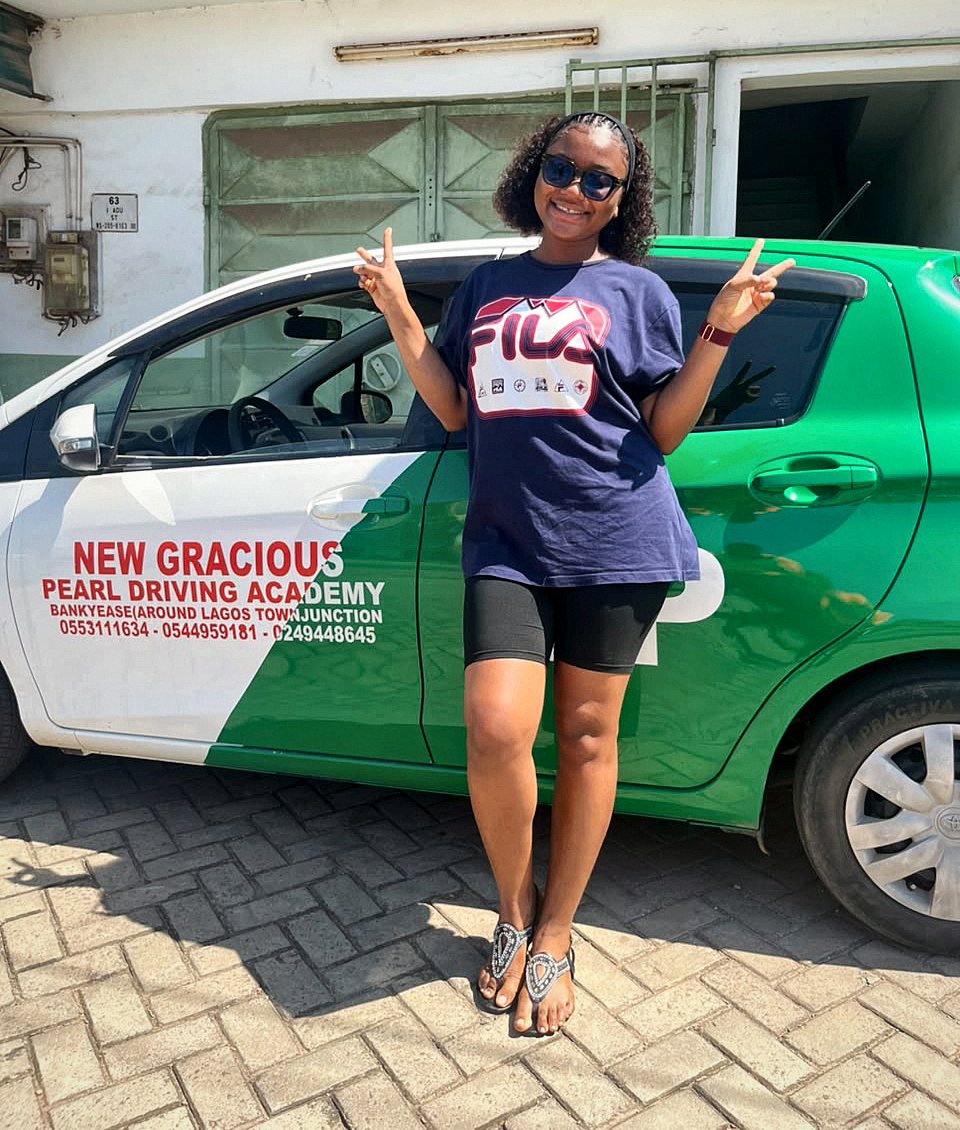 A happy student with a Gracious Pearl training car